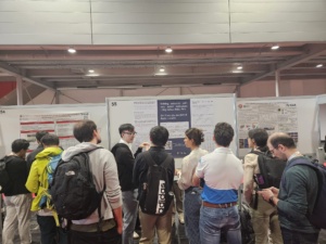 Samuel Lam presenting during a poster session.