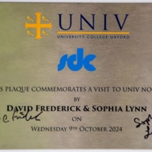 A plaque at Univ North signed by David Frederick and Sophia Lynn during their visit in October 2024