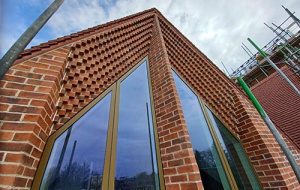 Univ North, Water Court West – corbelled 'arrowhead' brickwork detail to second floor bedrooms